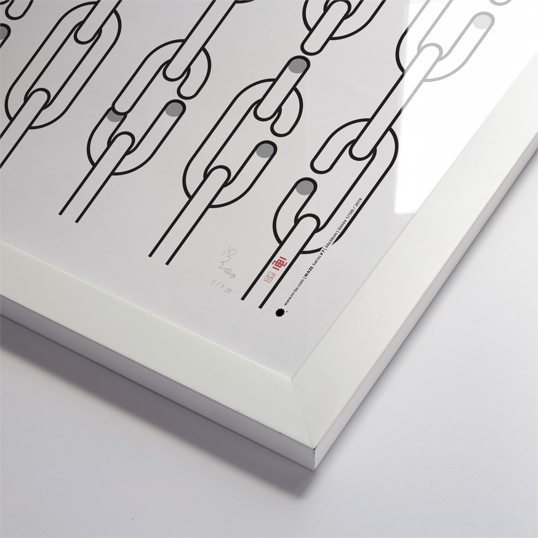 Maze #7 in white satin frame.
